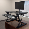 CASSIOPEIA Desktop Sit-Stand Retrofit - In Use Standing Position